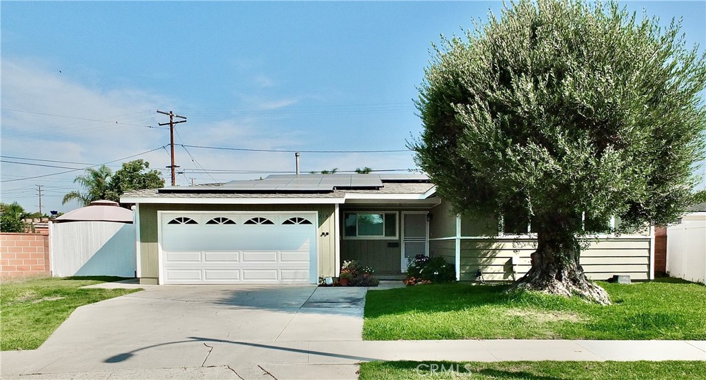 This home features a large lot with plenty of space, including RV parking and side access. The exterior trim and interior have been freshly painted.A new kitchen features stainless steel appliances,quartz counters and a bar top.The primary bath has a modern dam-less walk-in shower, and the other two bathrooms have been stylishly remodeled. Other amenities include two charging stations, two tankless water heaters, owned solar panels, and an attached two-car garage with laundry. The expansive backyard offers potential for an ADU or a pool. It is a great opportunity with endless possibilities!