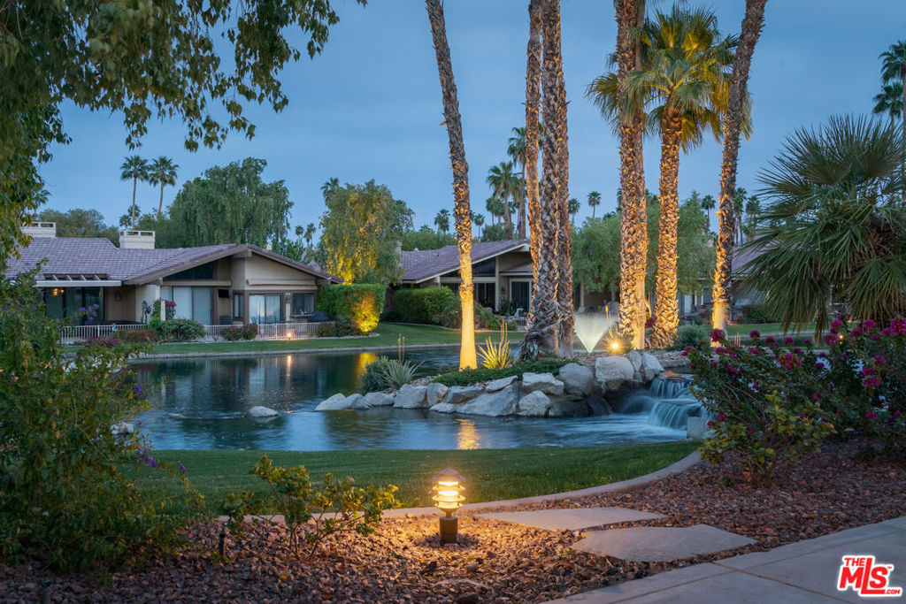 Discover the epitome of resort-style living in this charming 2-bedroom, 2-bathroom condo at The Lakes Country Club. This home, positioned in the center of the community on a peaceful cul-de-sac street and bordered by a mesmerizing waterfall, offers an atmosphere of tranquility and luxury. Imagine waking up to the soothing sounds of water and stepping out to a patio that brings nature right to your doorstep. The Cheyenne Floorplan is a welcoming space with an open concept that maximizes both comfort and style. Recently updated with new flooring and fresh paint, the interior feels freshened, while holding onto its homely charm. The kitchen is a chef's delight with stainless steel appliances and ample storage, opening up endless possibilities for culinary exploration. Indulge in leisurely days at the swimming pool and spa that is conveniently located just a couple doors down from the unit, or engage in the active lifestyle offered by the community. Enjoy the 27 championship holes of golf, a state-of-the-art fitness center with temperature-regulated swim lanes, and a grand clubhouse that stands as the hub of social gatherings. Sports enthusiasts will revel in the variety, from tennis to pickleball courts, offering something for every pace. Moreover, family outings have never been easier at the picnic grounds, which feature bocce ball courts, multiple grills, and a playground complete with a basketball court. This condo isn't just a home; it's a gateway to a vibrant lifestyle surrounded by the best nature and amenities. Don't let this dream pass you by and embrace the blend of relaxation and active living today!