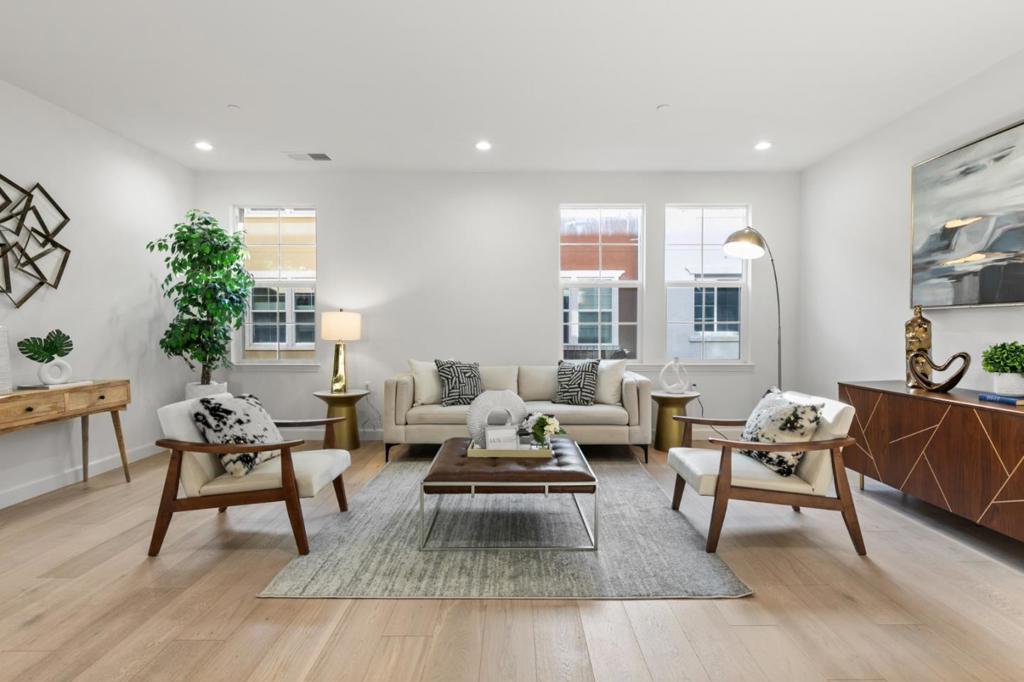 Stunning 3 bedroom, 2.5 bathroom plus a den/office townhouse in prime sought-after Silicon Valley location! Extra neat and clean, this open floor plan townhome features lots of fresh paint and gleaming floors. Located in the quiet center of complex. Bright and airy, the living spaces are integrated by an open half-wall that provides a visual connection between the living, dining, and family rooms, creating an inviting ambiance. The large master bedroom also including a walk in closet. Parking is a breeze with a spacious dual car garage, and there is an extra-large laundry room that doubles as a versatile area, adding value without eating into the official square footage. Comfort is key with a dual-zone heating and cooling system, ensuring year-round bliss. Nearby, discover a plethora of dining options and shopping destinations, Minutes from Downtown Sunnyvale, Near Cal train station, Minutes from Apple, Google, LinkedIn, and NVIDIA, making it an ideal spot for professionals seeking a short commute! IT IS A MUST SEE!