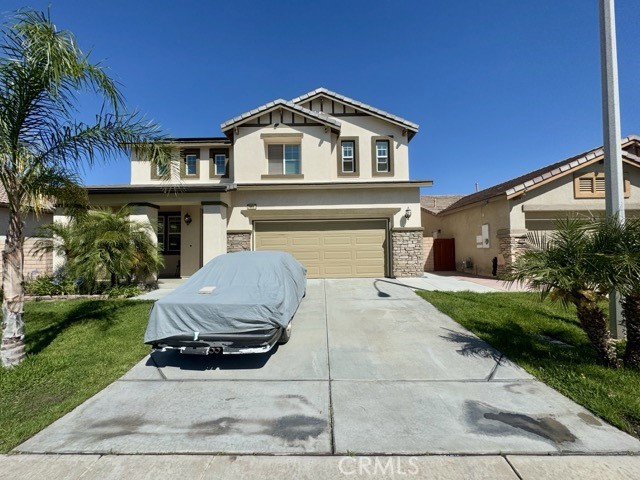 This upcoming 4 bedroom, 2.5 bathroom home with Solar is located in the highly desirable Tierra Shores gated community in Menifee and offers the perfect blend of spacious living and modern comfort. With wonderful curb appeal, the home features a three car tandem garage providing ample space. Inside, you’ll find soaring ceilings, laminate flooring, and an abundance of natural light that highlight the open-concept layout and create a warm, inviting atmosphere. The kitchen features oak cabinetry, granite countertops, stainless steel appliances and seamlessly opens to the family room, ideal for entertaining and everyday living with a cozy fireplace. All four bedrooms are located upstairs, each generously sized to accommodate a variety of needs. All 4 bedrooms will have the carpet replaced with band new laminate flooring prior to a tenant moving in. The primary suite stands out with its expansive layout and luxurious ensuite bathroom, which includes dual sinks, a soaking tub, separate shower, and a walk-in closet. Venture outside to a beautifully landscaped backyard with fresh mulch making maintenance a breeze and plenty of room to relax or entertain. The backyard also offers a firepit and fruit trees! As a resident of Tierra Shores, you’ll enjoy access to exceptional community amenities including a pool, clubhouse, playgrounds, and scenic Menifee Lakes. Conveniently situated near shopping, dining, schools, and entertainment, this home truly has it all!