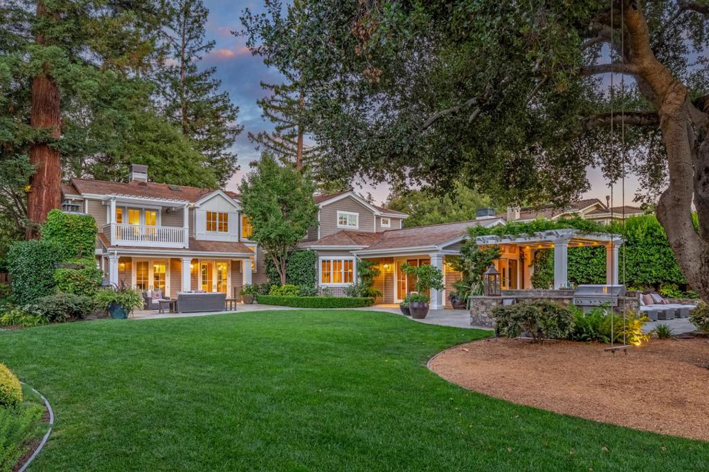 Designed and built by renowned Pacific Peninsula Group, this home seamlessly blends luxury, a floor plan fit for a modern family lifestyle, and spectacular outdoor living on nearly one-half acre in premier North Los Altos. From the stunning cedar exterior, to the exquisite millwork and stone, around every corner is a new feature to enjoy. The main level offers elegant formal living and dining rooms, and a fabulous great room encompassing the gourmet eat-in kitchen with luxe appliances and the spacious family room with a fireplace and access to the incredible grounds. Working from home is a dream with a rich executive office, second office, and a childrens study. Four bedrooms sit on the upper level, each with direct access to a full bath. The primary suite has a large balcony overlooking the park-like yard, a customized walk-in closet, and a spa bath. The lower level has a fully-equipped media room, recreation room, wine cellar, bedroom, and a full bath. And the fabulous yard, expertly designed by Tom Klope Landscape Design, is the ideal venue for entertaining and family fun, with fireside lounge and covered dining patios, an outdoor kitchen, large pool and spa with a waterfall, vast lawn, priceless mature trees, and high perimeter hedging for ultimate privacy and tranquility.