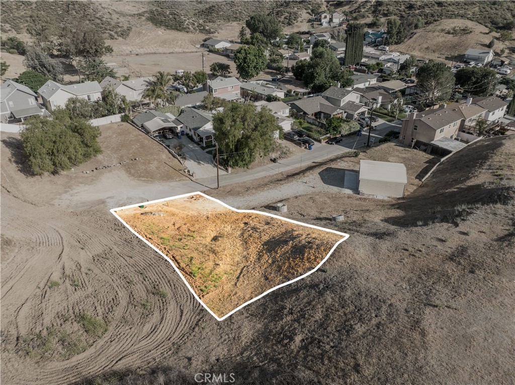 Great opportunity! This lot is situated on a paved road, surrounded by established homes in a developed neighborhood. Utilities including water, electricity, and gas are conveniently available right in front of the property. Zoned R-1 for a Single Family Residence, it offers an ideal location just minutes from community park, freeway access, shopping centers, restaurants, and the excitement of Six Flags Magic Mountain. Plus, you’re only about an hour from the beach! An excellent opportunity, competitively priced for a fast sale.