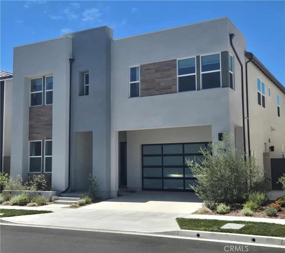 Stunning MODEL-LIKE & TURNKEY Home in the Prestigious Magnolias at The Meadows – Lake Forest! Built by luxury builder Toll Brothers, this 5-bed, 5-bath residence offers DESIGNER UPGRADES throughout and an ideal PRIME INTERIOR LOCATION NEAR the first class clubhouse. Enjoy unobstructed mountain views and over $200K in premium UPGRADES. The open layout features soaring ceilings, a guest bedroom/office on the main level with full bath, a bright living room , open to dining area and a gourmet kitchen with quartz countertops, custom ceiling-height extended cabinetry with plenty of storage space, a massive island , a 48” Jenn-Air built-in fridge, and 6-burner cooktop, touchless faucet. Upstairs, you'll find a huge loft, a luxurious primary suite with electric shades, oversized walk-in closet, spa-inspired bath with designer upgrades, three additional en-suite bedrooms, and laundry room. HIGHLIGHTS include: California Room and beautifully professionally landscaped/hardscape yard with olive & privacy trees & natural stone accents, accent wall, FULLY Paid Solar Panels, Tankless Water Heater, LVP Flooring, Surround Sound , Glass Garage Door with Epoxy Floor, Glass Railing, Upgraded Baths & Cabinetry, Located in a highly sought-after neighborhood , resort-style community with clubhouse, pools, parks, pickleball, playgrounds, and dog parks—all with NO Mello-Roos and LOW property taxes. Minutes from shopping , restaurants areas, and trail. This is a RARE TRUNKEY opportunity not to be missed!