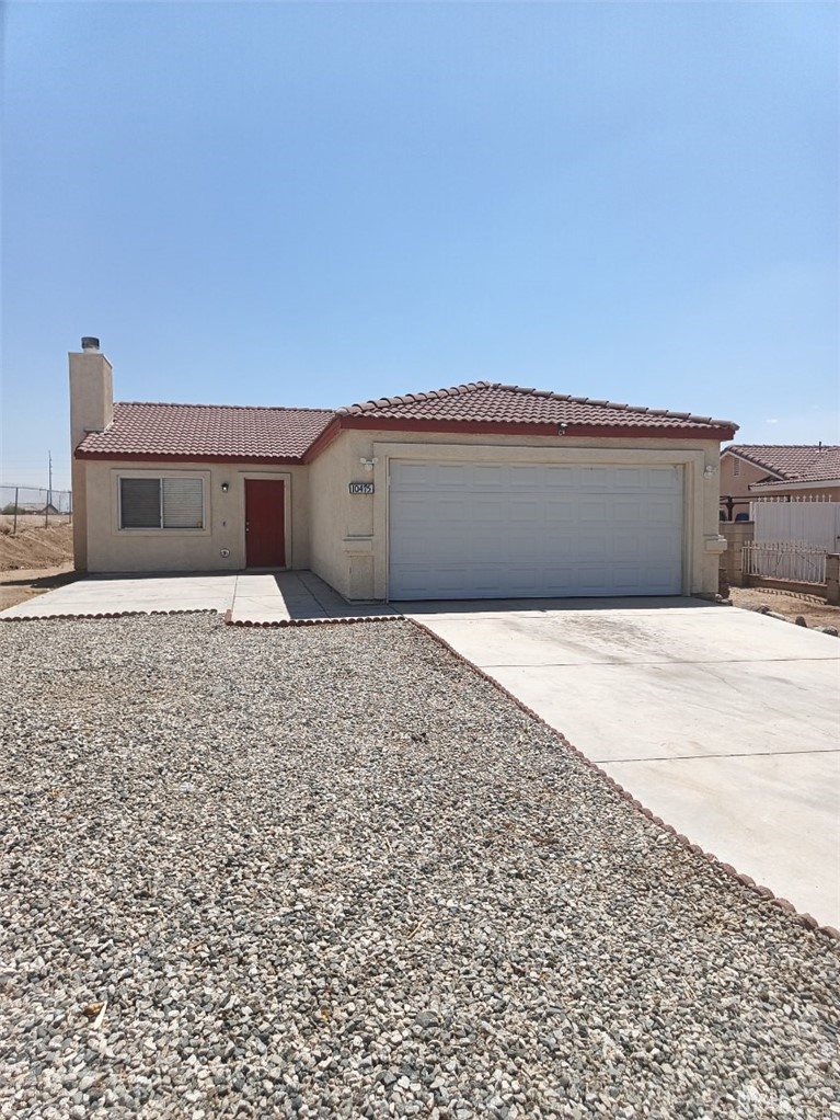 This house is located on a quiet cul-de-sac. The house has new flooring and paint. The lot is large and great for outdoor events or a garden.
Master bedroom has a attached bathroom and large closets. Living room is large, there is a fireplace that has been covered, but could easily.
be uncovered. Kitchen is open to dining room and living room. Kitchen has a stove, microwave and dishwasher. The refrigerator also comes with the house. The house and yard are surrounded by a fence with a gate.