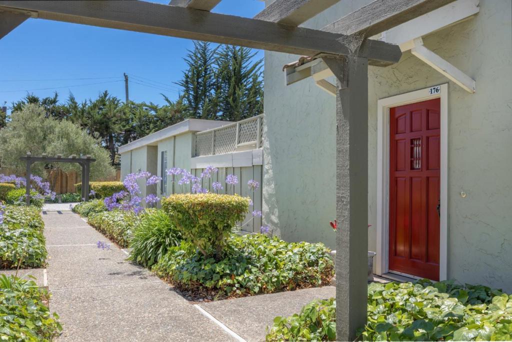 Welcome to this beautifully cared-for townhouse nestled in one of Watsonville's most peaceful and well-kept complexes. From the moment you step inside, you'll feel the warmth and pride of ownership throughout. This inviting home features a thoughtfully designed layout, combining comfort and functionality with tasteful updates and natural light in every room. The spacious living area flows seamlessly into the dining room and kitchen, and features a bedroom and full bath on the ground floor. Upstairs, you'll find the master suite with en suite bath and walk-in closet. Outside, enjoy a private patio perfect for morning coffee, weekend BBQs, or simply unwinding. The complex is beautifully maintained, with mature landscaping, green spaces, and walking paths that foster a true sense of community. Located just minutes from local schools, shopping, parks, and the Monterey Bay coastline, this home offers the perfect balance of convenience and charm. Whether youre a first-time buyer, downsizing, or investing, this lovingly maintained townhouse is a rare find in a welcoming neighborhood.