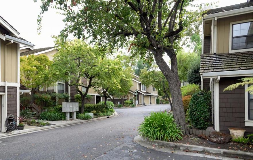 NO Showing until Open House on 10/4/2025.   All Staging shown is virtual.   When you enter 584 Valeri Ruth Ct, you will be struck by this light and bright spacious townhome.  This light-filled townhome blends comfort, style, and convenience  perfect for todays lifestyle.   The spacious living room and adjoining dining area receive bright natural light from the large sliding doors that look out on your own private patio.  This home has been fully updated with fresh paint, new carpet, new bathroom vanity, interior doors, new electrical sub-panel.  New stainless oven/range and dishwasher brighten up the kitchen.  Inside laundry.  Washer/dryer and refrigerator are included.  The two spacious ensuite bedrooms have soaring vaulted ceilings and large windows.