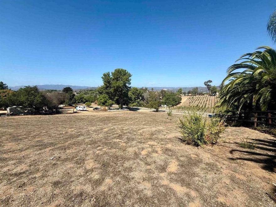 One acre plus property with a great head start towards building your home.  Grading and house plans are submitted to the county for final approval.  Septic layout is approved for up to 4 bedroom house.  Power is at the edge of the property.  Paved county maintained road for access.  Panoramic views of Santa Margarita Valley, De Luz Hills and Vineyard 1924.  There is no HOA or CCRs. Bring the toys, animals, vision and make your goals happen.  The property is zoned RR--Rural Residential.