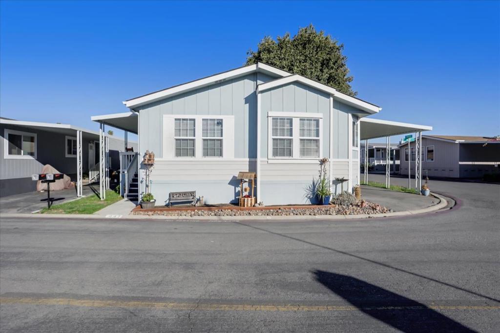 Bright and spacious home situated on a corner lot across the street from ample visitor parking! This home offers a sizable eat-in kitchen with an island plus tons of cabinet space for storage, making this home an entertainers delight! Large separate dining room is perfect for hosting your next holiday dinner or event, Then unwind in front of a cozy fireplace in the main living space. 3 comfortably sized bedrooms perfect for a family or roommates. Primary suite has a spa like attached bathroom to escape the day in! Plenty of natural light plus brand new interior paint thru out make a winning combination. Enjoy outdoor living on the covered porch, with dedicated grass/yard space perfect for pets and children. Conveniently located to major freeways, shopping, and light rail. Live here and love the way you live.