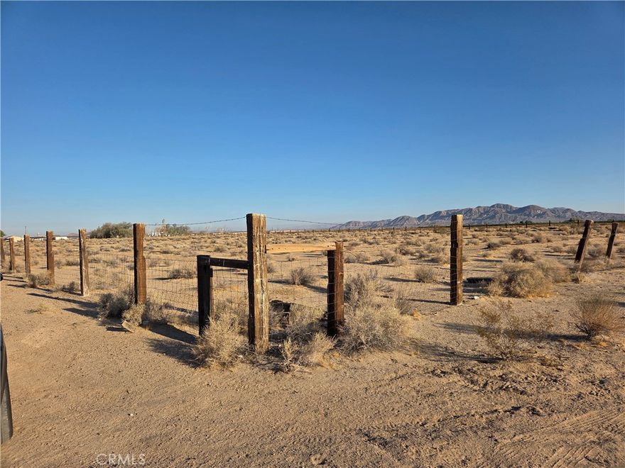 Five-acre parcel located at the corner of Mineola Rd and Swansea St in Newberry Springs. Electricity is directly adjacent to the property, offering convenience for future development. Newberry Springs is known for its abundance of well water, with most owners enjoying their own private supply directly to their property. Surrounded by beautiful desert views and just five minutes from the I-40, this RL-5 zoned lot sits right off paved Mineola Rd, directly behind 33033 Mineola Rd. Swansea St provides direct dirt road access to the property. Utilities are nearby, making this an excellent opportunity for your next project or investment.