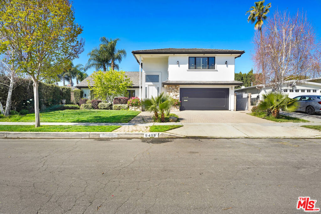 Welcome to this fabulous Lake Balboa, fully remodeled, bright, airy, open-floor concept home designed for comfort and elegance; it boasts a second-floor in-law suite with separate entrances. Nestled in a sought-after neighborhood, ideally situated near the multi-million dollar Encino border; easy access to Encino's upscale dining, shopping, and entertainment while benefiting from the value of the 91406 market. Homes of this caliber offer a blend of modern sophistication, high-end finishes, and investment potential. A remarkable main house encompassing 2,482sq.ft., starring a master retreat hosting an abundance of natural light, extensive closet space, and a sexy en-suite, 2 additional large bedrooms, and a bathroom. It showcases beautiful marble floors, quartz countertops in all the bathrooms, and hardwood floors throughout. Featuring a designer kitchen with all the amenities for a gourmet chef. Expansive, yet elegant living room, and dining room introducing floor-to-ceiling according doors leading to a beautiful patio and backyard. Relax in your inground jacuzzi or sit around the massive firepit. No need to run back and forth inside to the kitchen while entertaining when you have a room outside that poses as a kitchen. On the other side of the yard, you have a large bright office/workshop. Upstairs you get a 592 sq.ft. In-law suite with two private entrances and is completed with a living room, kitchen, bathroom, office space, two skylights and large bedroom with a built-in refrigerator. It can easily be converted into an ADU. This stunning home has so much more to offer and is just waiting for you to step in and make it your own.
