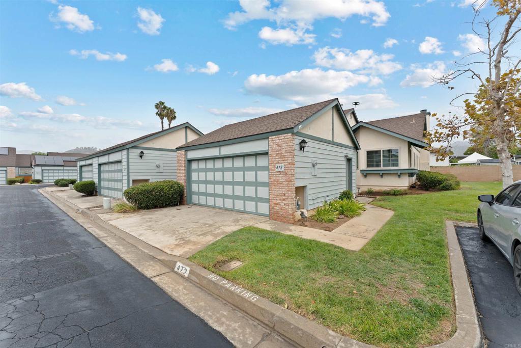 Welcome to this charming end-unit single-story home in the highly desirable Cape Concord community of Escondido. This 2-bedroom, 2-bathroom residence offers an inviting layout with vaulted ceilings, a cozy gas fireplace, and abundant natural light throughout. The spacious primary suite features an en-suite bathroom and generous closet space, while the secondary bedroom makes a perfect home office, guest room, or den. The open-concept living and dining area flows seamlessly into the private backyard, ready for your personal touch, ideal for relaxing, entertaining, or gardening.