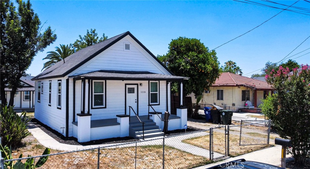 BEAUTIFULLY RENOVATED Fresh and back to the market!!! INVESTOR FRIENDLY Multi-Family Home with ADU-Turnkey & Move-in-Ready! Close to schools, shopping centers and restaurants. This newly renovated multi-family property offers a total of 3 bedrooms and 1 bathroom in the front house boasting 816 sq ft plus a fully equipped 1bedroom, 1 bathroom ADU in the back-complete, with its own kitchen and living room, boasting 476sqft for a total of 1292 sq ft of living space on a generous 6,750 sq ft lot. This home is perfect for a multi-generational living or rental income potential. Upgrades includes upgraded electrical panels, recess lighting, new siding, new hardwood Vinyl waterproof floors throughout, quartz countertops, fresh interior and exterior paint, new windows, new roof, new electrical and plumbing, new doors, and new cabinets. Both the main house and the ADU feature modern mini split units for year- round comfort. Don't miss this opportunity to own a turnkey property with endless possibilities! Each unit is thoughtfully designed for comfortable living, with great rental opportunities. The property delivers an attractive cap rate, making it a strong addition to any investor’s portfolio. Whether you're looking to expand your real estate holdings or start with a solid multi-family investment this income generating gem checks all boxes, *FRONT HOUSE address 1235* *ADU address 1237*