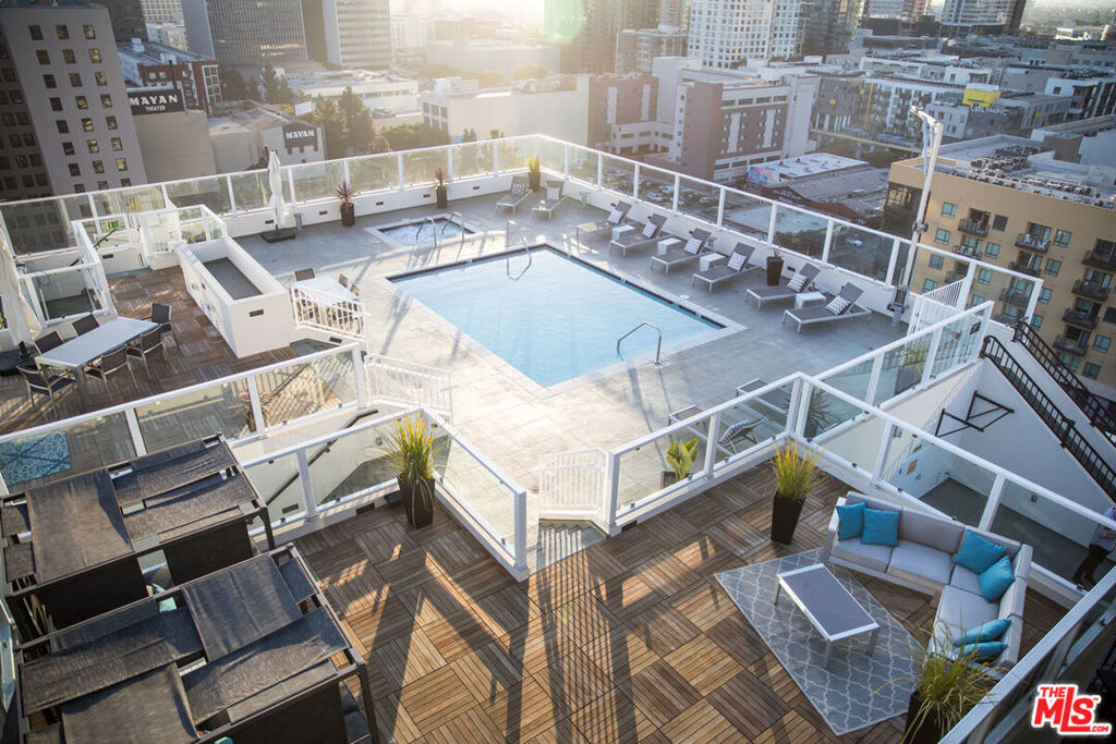 Amazing AirBnB investment opportunity in DTLA! This art-deco themed unit boasts 9' ceilings, upgraded soundproof windows, natural light, neutral tile, quartz counters, and SS appliances. Everything conveys. Everything is included to begin generating income from Day 1. This is an opportunity to purchase a successful short-term rental in a prime location, close to shops, restaurants/bars, and Crypto arena. Building amenities include rooftop pool/spa, on site gym, 24-hour security, and the lowest HOA fees in DTLA. This is an active AirBnB. Please text listing agent to coordinate a viewing on cleaning days. No lockbox access. Please schedule showings in advance. This property is one of the few that through a successful application is allowed to operate Transient Occupancy Tax (TOT) which allows for AIrBnB with the correct permits that are renewable on a yearly basis. To further attract this property, all Furniture and Furnishings will be included in the sale. Additionally, The unit features upgraded windows for sound deadening that sets this unit apart for comfort. This property is in a census tract that has been designated a High Cost Area. For FTHBs with income less than $10,570/mo, the High Cost Area Purchase Program offers up to $16,023 in agency credits for an interest rate buy down. Please consult with a licensed mortgage professional for more details.
