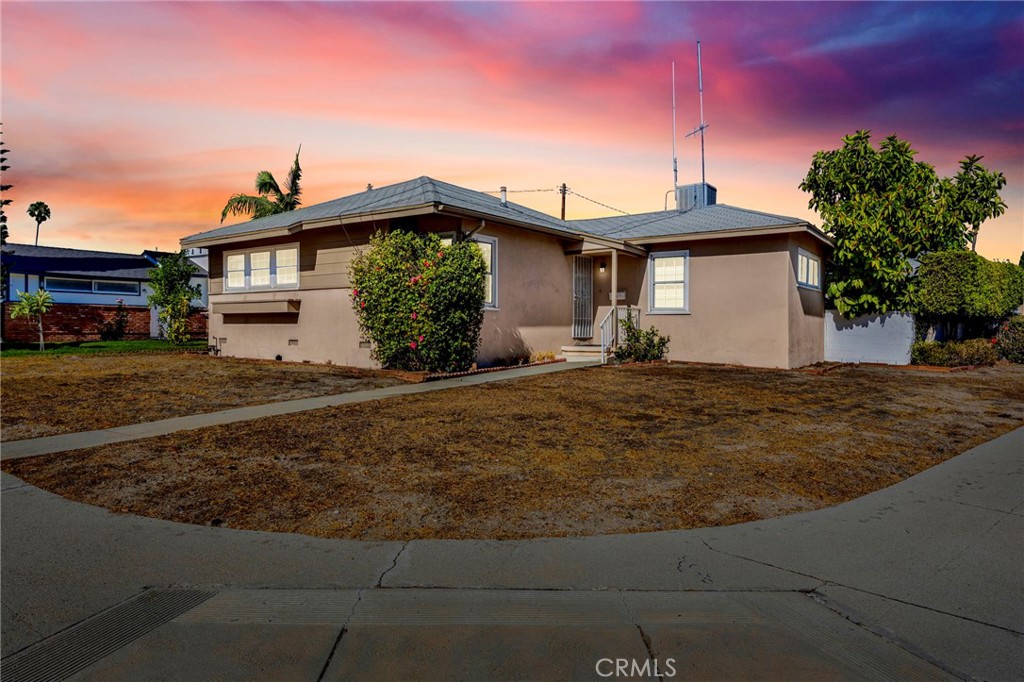 Welcome to this North Hollywood POOL home, perfectly situated on a desirable 7,100+ SF CORNER LOT. Offering 3 bedrooms and 2 bathrooms, this residence combines charm, functionality, and potential, with the added bonus of ADU possibilities. This home has NEWER PAINT inside and out, LAMINATE FLOORING in the main living areas, creating a bright and inviting atmosphere. The spacious living room is filled with natural light from NEW WINDOWS and a large sliding door that opens to the backyard, seamlessly blending indoor and outdoor living. The dining area sits adjacent, making it perfect for gatherings. The kitchen features a cozy BREAKFAST NOOK with wainscoting panels, wood cabinets, and an overhead ceiling fan. A large DEDICATED LAUNDRY ROOM with storage adds convenience. This home has three well-proportioned bedrooms and two bathrooms, including a private PRIMARY SUITE with its own ¾ bath featuring a step-in shower, frosted glass door, dark tile accents, and a tiled vanity. The two additional bedrooms are bright and inviting with wrap-around windows, vertical blinds, ceiling fans, and double-door closets, providing flexible space for family, guests, or a home office. A spacious hall bath highlights VINTAGE CHARM with a large tub, white tile surround, a wide vanity ledge, and calming periwinkle walls, complemented by convenient hallway linen storage. Recent upgrades include a NEW ELECTRICAL PANEL with new breakers, a NEW TANKLESS WATER HEATER, and all NEW COPPER PLUMBING. Step outside to your own backyard retreat. A covered patio overlooks the sparkling POOL and fenced yard, providing the perfect setting for entertaining, relaxing, or enjoying warm summer days. Additional highlights include a 2-car garage with shelves and an automatic opener, adding functionality and storage. This corner-lot gem offers both immediate comfort and long-term opportunity. Located just minutes from parks, shopping, dining, the NoHo Arts District, and major freeways. Opportunities like this, offering size, location, charm, and flexibility don’t come around often!
