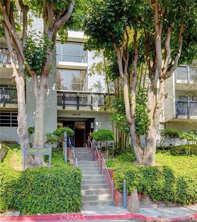 Welcome to this beautifully updated top-floor end unit, featuring a rare and spacious floor plan designed for both comfort and privacy. This light-filled home offers two generously sized bedrooms, each with its own en-suite or nearby bathroom and walk-in closet, positioned on opposite sides of the unit—ideal for roommates or guests. Both bedrooms enjoy direct access to a large private balcony overlooking tranquil, tree-lined surroundings. The expansive living area opens seamlessly to the balcony, location The bright, updated kitchen is equipped with new stainless steel appliances, including a refrigerator and stove, making meal prep a delight. Located in The Estates, this well-maintained complex offers resort-style amenities: two swimming pools, a spa, sauna, tennis courts, fitness center, and a clubhouse with billiards and a community room. Nestled beside the South Bay Botanical Garden and part of the award-winning Palos Verdes School District, this location offers both serenity and top-tier education. Don't miss the chance to rent one of the most desirable floor plans in this lush, amenity-rich complex.