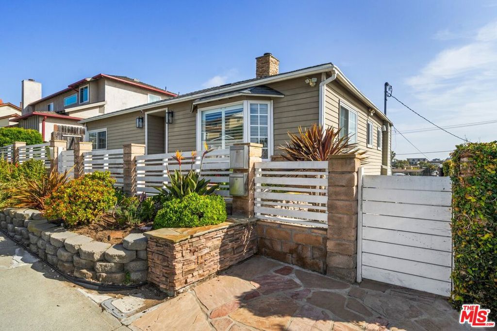 Available furnished or unfurnished. This beautifully updated 3BR single-family home with ADU (for 4 total bedrooms) in the tranquil beachside neighborhood of Playa del Rey is available for immediate rent. Located moments from the Pacific Ocean, this residence offers a perfect blend of coastal living and modern amenities. This spacious home provides ample living space with 3 bedrooms and 3 bathrooms across 2,309 square feet.  The modern chef's kitchen, equipped with quartz countertops and new appliances, is perfect for culinary enthusiasts. The expansive primary bedroom, featuring stunning bluff and tree views, includes an ensuite bathroom for added privacy. The primary bedroom has extra large, corner-to-corner windows for panoramic views, plus hardwood on the floor and the ceilings. A versatile second bedroom on the main level is separate from the primary bedroom. Downstairs, a large third bedroom with a full-size bathroom offers comfortable accommodations. In addition, the attached ADU with a private entrance provides ideal accommodations for guests or extended family. The recently redesigned private backyard, complete with outdoor furniture and heat lamps, is perfect for relaxation and outdoor gatherings. This home is also available furnished with the owner's furniture (at additional cost). Note, there are steps from the primary bedroom to the ensuite primary bathroom. The 3rd bedroom is located downstairs.