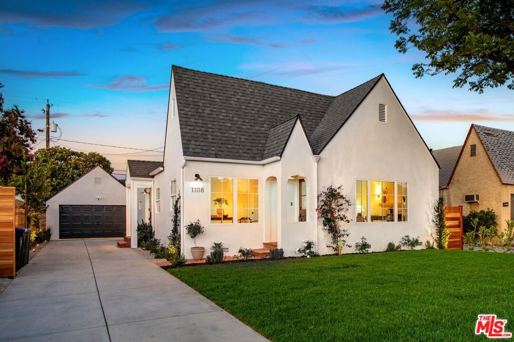 Luxurious Magnolia Park Tudor cottage. Completely remodeled spacious 2,005 sq. ft. 4+3 (2 main en suites incl. balcony, walk-in closet, wet room w/spa shower and oval tub). Built in 1930 when Magnolia Park was blossoming w/new storybook homes convenient to major studios. Charming Dutch-door entry to open plan enhanced by flowing hardwood floors, vaulted ceilings and skylights. Windows (and doors) are all new. Original plaster details, new smooth stucco and new roof. Bright inviting fireside living room flows to new designer kitchen featuring quartz countertops, large island, stainless steel appliances, farmhouse sink, open shelves, dining area and huge family room w/fabulous arched alcove of built-ins and sliders to patio. Stackable laundry and central HVAC. Private outdoor oasis w/patio, deck and new landscaping. Detached garage and additional approx 100sqft finished shed or playroom + room for pool on flat, fenced 6,750 sq. ft. lot. Short stroll to amazing coffee, restaurants and shopping. Top rated schools.