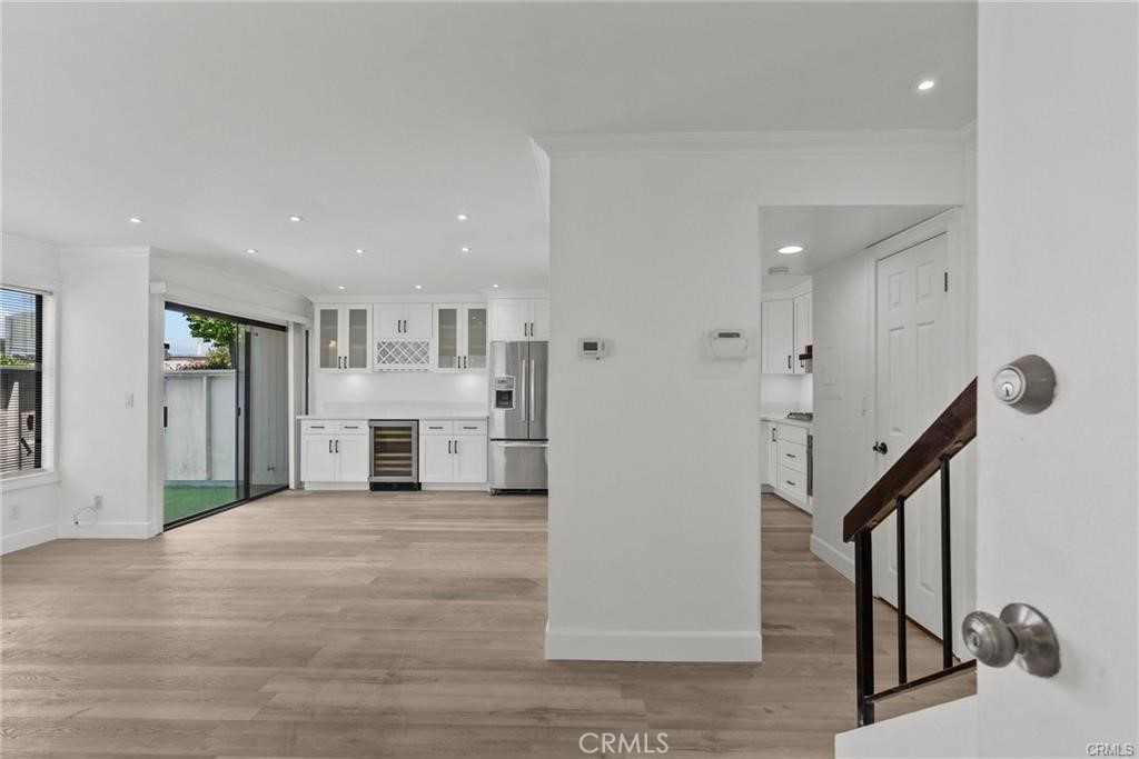Unique, End Unit, Recently Remodeled (Comfort, Convenience, and Style), In one of the Best Townhome Complexes in the Area. It is Only Unit in Complex that has Extended Kitchen/Dining Area Including Extra Cabinets, Wine Glass Rack and Cooler, Newer Flooring, Newer Paint, Recessed Lighting, Fireplace, Window Coverings, Built In Appliances Including Dishwasher, Refrigerator, Stove, Burners, Countertops, and Laundry Area off Kitchen. Lots of Living/Dining Room Area and Guest Bathroom Lower Floor. 2 Good Size Bedrooms Upper Level with Walk In Closet and Master Bathroom. There is a Nice Enclosed Patio for Children, Pets, and Bar B Que Entertaining. The 2 Car Garage is Directly Across Unit Entry. The Complex has Outdoor Pool and Spa and Tennis/Pickle Ball Courts. Close to Shopping and Transportation. This Townhome has Everything.