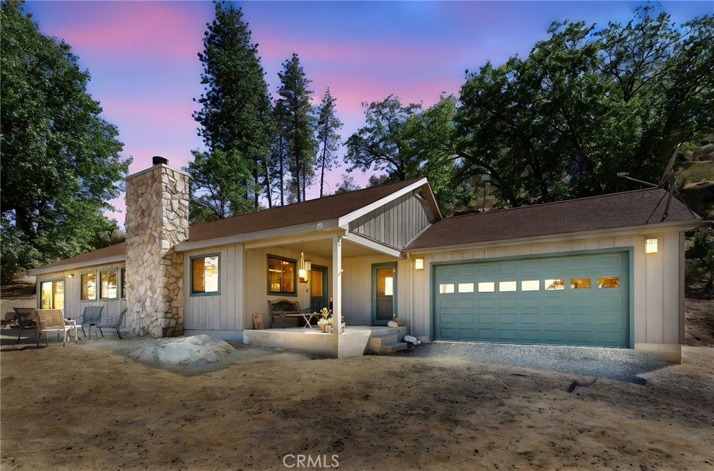 Your Dream Getaway: The Perfect Blend of Seclusion and Serenity near Yosemite. Discover an extraordinary Yosemite area getaway that offers the perfect blend of luxury, privacy, and connection with nature. Tucked away at the end of Mount Bullion Ridge Road in Mariposa but surrounded by friendly neighbors who love the serenity too. This 40-acre property provides unparalleled tranquility and security. As you look out from the home, the view is a living masterpiece of the Sierra Nevada mountain range, including iconic landmarks like El Capitan, the roads to Glacier Point and Tioga Pass, and the peaks above Hetch Hetchy Reservoir. Imagine starting your day with a spectacular sunrise and ending it with a front-row seat to the Milky Way.
The custom-built house is an architectural gem, with 3 bedrooms and 2 bathrooms, spanning approximately 1,750 square feet. The interior showcases stunning craftsmanship, including kitchen cabinets crafted from Ponderosa Pine trees harvested from the property. The dining room table and fireplace mantle were also custom-milled from a Black Oak tree that stood on the property. A high-efficiency wood-burning fireplace, with an efficiency rating of over 60%, can heat the great room and master suite on chilly nights.
Adjacent to the main house is a 1,900 square-foot log cabin , also built from Ponderosa Pine trees from the property. This versatile structure is currently a workshop, office, and hobby room , but has the potential to be converted into a second residence. For the creative mind or DIY enthusiast, a fully equipped woodworking shop is included with the sale, featuring a Delta table saw, thickness planer, and other quality tools .
Beyond the main structures is a small wine cellar. This property is a prepper’s dream. The well is 220 feet deep and reliably produces 20 gallons of water per minute. Water is stored in a 2,500-gallon uphill tank that provides 40 PSI of pressure to the house. The property also features a 3,000-gallon fire protection tank with a CalFIRE hose fitting, designed to attract wildlife as well. A separate utility shed keeps gas-powered equipment safely away from the house.
The sale includes a curated list of personal propertyto ensure a seamless transition into your new life. You'll receive a Kubota B7500 tractor with attachments , a full suite of kitchen appliances including the washer/dryer and refrigerator , and yard maintenance equipment. See Agent Remarks for full list of items.