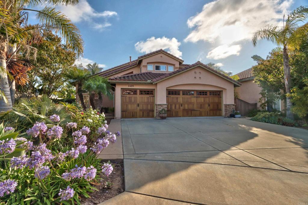 Stunning Fire Mountain Ocean View Home! Located on a private cul-de-sac of just 10 custom homes, this 4-bedroom, 3-bath residence offers ocean views, coastal breezes, and a beautifully landscaped .25 +/- acre lot! Built in 2001, this home features vaulted ceilings in some living areas and bedrooms, creating a light, open atmosphere. The remodeled kitchen - with stainless steel appliances, custom cabinetry, and an expanded layout - opens to the inviting family room with a cozy fireplace. Formal living and dining rooms, along with a full bedroom and bath on the main level, offer flexible living options ideal for guests or a home office. Upstairs, the primary suite impresses with ocean views, a private fireplace, a spa-like bath with dual sinks and soaking tub, and a seriously large walk-in closet. Two additional bedrooms and a full bath complete the upper level. French doors lead to a southwest-facing, wrap-around patio and terraced backyard - perfect for entertaining or simply relaxing in privacy. The fully fenced yard, mature landscaping, and peaceful setting create a true retreat. Additional highlights include a 3-car garage with custom doors, epoxy floors, and a tankless water heater. With no HOA or Mello-Roos fees and close proximity to beaches, shops, and freeway access, this move-in-ready home is a rare Fire Mountain opportunity. ***Make sure to check out the virtual tour!