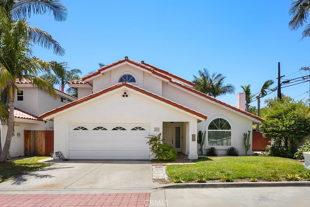 Live the Eastside Costa Mesa dream in this stylish, remodeled 4-bedroom, 3-bath gem at La Costa Court, where laid-back living meets modern convenience. Just minutes from Upper Newport Back Bay, shopping, top-rated schools, and the beach, this home offers the ultimate Southern California lifestyle. Step inside to soaring ceilings, sunlit spaces, and an open-concept design. The freshly updated kitchen boasts stainless appliances (including double ovens and a gas cooktop), sleek countertops, and a subway tile backsplash, perfect for culinary evenings and entertaining friends. Gather in the expansive family room around a cozy gas fireplace, or kick back in the living room under cathedral ceilings with abundant natural light. Enjoy indoor-outdoor living with your private patio and spacious backyard, ideal for play, or evening relaxation. Flexible downstairs bedroom and remodeled full bath offer convenience for guests or a home office. Upstairs, retreat to the primary suite with dual vanities, walk-in closet, and soaking tub. Two additional bedrooms with a full bath complete the upper level. Bonus features include a garage, Tesla charger, and storage. Lightly furnished with beds, couches, and TVs, with the best of Eastside Costa Mesa within its reach, this La Costa home is ready for you to move right in, relax, and enjoy.