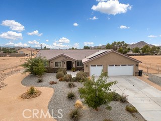 Discover modern ranch living at its finest in this beautifully appointed 2022-built home nestled in a desirable, established Apple Valley neighborhood. Set on nearly a full acre of flat, fully fenced land, this turnkey property offers the perfect blend of comfort, functionality, and flexibility—whether you're seeking a peaceful retreat, a place for your horses, or room to store all your toys.
Step inside and be welcomed by an inviting open floor plan designed for easy living and entertaining. The spacious primary suite is thoughtfully positioned on one side of the home, offering privacy and comfort with a large walk-in closet, dual vanities, and a stunning walk-in shower. Three additional bedrooms and a full bath are located on the opposite wing—ideal for guests, multigenerational living, or a home office setup.
Enjoy your morning coffee in the enclosed sunroom with large windows and a pet-friendly doggie door, or unwind in the evening on the expansive covered patio—perfect for taking in serene desert sunsets and stargazing nights. The professionally landscaped grounds feature dusk-to-dawn exterior lighting, a sprinkler system, and plenty of usable space for gardening, recreation, or hobby farming.
Inside, you’ll appreciate upscale touches like KitchenAid stainless steel appliances, a cozy gas fireplace, and modern conveniences including a Ring system, wired security, and a fully paid-off solar energy system—providing substantial energy savings from day one.
Additional features include:
3-car garage with ample storage
Zoned for horses
Split floor plan for enhanced privacy
Move-in ready with screen door and thoughtful upgrades throughout
Ideal location to enjoy nearby shopping, dining, schools, and front-row views of the 4th of July fireworks
?? Whether you're starting a new chapter, expanding your lifestyle, or simply seeking space and serenity, 15620 Erie Road is a rare opportunity that checks every box. Come see this exceptional home in person—it’s more than a house, it’s a lifestyle.