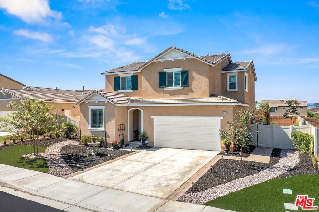 Your Dream Lifestyle Awaits in Olivewood. From the moment you pass through Olivewood's gates, there's an undeniable sense of serenity with tree-lined streets, mountain views, and the quiet hum of a community that feels worlds away from the ordinary. At the end of a beautiful drive, this 4-bedroom, 3-bath home awaits, offering not just a place to live, but a lifestyle to savor. Step inside, and light greets you at every turn. The open floor plan flows effortlessly, anchored by a chef's kitchen that seems made for lingering over coffee or hosting friends for dinner. Quartz countertops shimmer beneath Restoration Hardware lighting. Thermador appliances promise culinary excellence, and a reverse osmosis system ensures every sip of water is pure perfection. The living spaces invite connection yet offer the comfort of privacy. Custom plantation shutters filter the sun, wide-plank luxury vinyl flooring underfoot feels as good as it looks, and every detail has been chosen with care. A full-house water softener and solar power mean comfort comes with peace of mind, and so does the comprehensive security system with Ring Doorbell, cameras, and SimpliSafe smart locks. Upstairs, the loft tells its own story, currently a glamorous Hollywood-inspired lounge, but ready to become your home office, reading nook, or creative escape. The primary suite is a private retreat at day's end, with a walk-in closet, dual vanities, and an oversized shower that turns the morning rush into a quiet ritual. Step outside, and the backyard is nothing short of an amazing outdoor haven designed for both relaxation and entertaining. Multiple seating areas create inviting spots to gather, while a cozy fire pit sets the mood for evenings under the stars. A custom pergola casts dappled shade over the perfect entertaining space. The cornhole and gaming area invites friendly competition, while lush yet low-maintenance turf stays picture-perfect year-round. Even the landscaping, vibrant with drip irrigation, has been designed for beauty and efficiency. Beyond your door, Olivewood offers more than amenities; it offers experiences. Morning swims in the pool, sunset walks on hiking trails, pickup games on the courts, and neighborly gatherings. All of it set against the backdrop of secure, gated living and breathtaking mountain views. This is more than a home. It's where your story continues. Welcome to Olivewood.