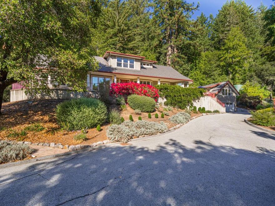 Welcome to this remarkable custom built 3-bedroom, 2.5-bathroom mountain estate just minutes from city of Scotts Valley and Hwy 17. With 2,583 square feet of living space, this residence offers a spacious and inviting atmosphere. It has 10 ft ceilings, a staircase with skylights and clerestory windows, French doors & tall windows bring in light and the beauty of nature. The kitchen is a chef's delight, featuring granite countertops, tile backsplash, a Viking range, and a suite of modern appliances. Enjoy casual meals in the breakfast room or host elegant dinners in the formal dining room. The home boasts a variety of flooring options, including carpet, hardwood, and tile, ensuring comfort and style. Added amenities include security gate, fire sprinklers, the mature landscaping is drought tolerant, on-demand hot water heater & outside security lights. The spacious patio is great for outdoor entertaining. Separate bonus room over the large two car garage could be office, gym, or art studio. The laundry room has washer/dryer and custom storage cabinets. Situated on 13+ acres which includes a portion of the historic stagecoach line from Los Gatos to Santa Cruz. A must see!
