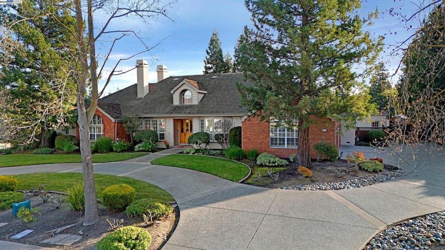 Come see this exquisite luxury home in Livermore’s prestigious Chardonnay Estates. This elegant, custom-built, 4,370 square foot home has a well-designed floor plan that makes daily living and entertaining comfortable and inviting.  The living and formal dining rooms are welcoming and have a lovely view of the front of the home. The dining room is beautiful and features a coffered ceiling and inlaid floor.  The grand kitchen has abundant storage and counter space and several options to sit and enjoy a meal. Near the kitchen, is a modest staircase which leads to a large loft with a .5 bathroom and endless possibilities! The family room is a cozy space with built-ins and a fireplace. The primary suite is spacious and includes dual walk-in closets and a large ensuite bathroom. This gorgeous home sits prominently on a premium .84 acre lot with a private park-like rear yard suitable to host memorable gatherings for years to come! There is an expansive 1,200 square foot workshop that includes heat, a/c, and a .5 bathroom. There is additional land accessible from a private road at the rear of the parcel. Chardonnay Estates is within minutes of Downtown Livermore, wineries, parks, schools, and in a convenient location for commuters! Come see all this exquisite estate has to offer!