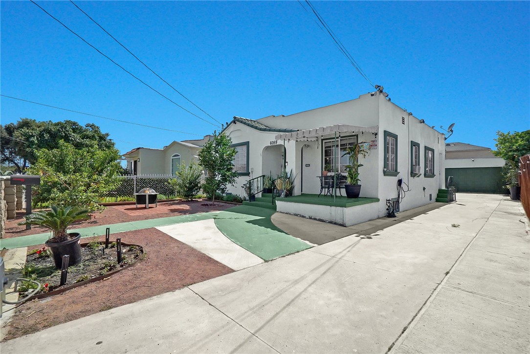 Charming Spanish-Style Home in the Heart of Huntington Park
Welcome to 6059 Riverside Ave, a beautifully refreshed 3-bedroom, 2-bathroom home offering over 1,200 sqft of comfortable living space with incredible potential. Set behind a classic brick and wrought iron fence, this inviting Spanish-style residence has been lovingly maintained and thoughtfully updated over the years. Inside, you'll find a timeless floor plan featuring a fully remodeled kitchen and upgraded bathrooms, blending classic charm with modern convenience. Home is EV car ready!
Situated on a generous 5,500+ sqft lot, the property also includes a detached garage—perfect for a future ADU conversion, studio, or additional living space. Located just blocks from local elementary and middle schools, daily routines are a breeze with everything close by. Plus, with easy access to major streets and highways, you're perfectly positioned to explore all that Los Angeles has to offer. This is a must-see opportunity to own a home with character, convenience, and long-term potential!