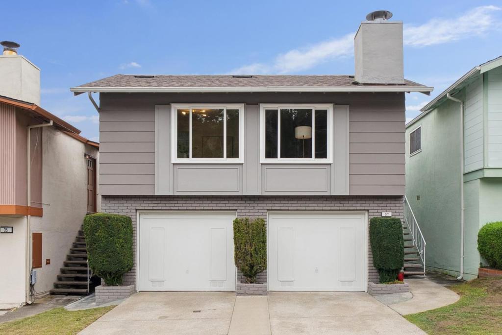 Some homes are built for just one chapter, but this Daly City gem is ready for all of them. Sunlight pours through the upstairs living and dining areas, seamlessly connecting to a newly updated kitchen with modern finishes, stainless steel appliances, and a cozy eat-in nook that makes even weekday dinners feel special. Three bright bedrooms and a refreshed bathroom with a double vanity and walk-in shower complete the main level. Downstairs, a flexible retreat with its own entrance, full bath, and garage access opens the door to countless possibilities: a guest suite, home office, or even rental income. Step outside to a private patio and enclosed yard, designed to be low-maintenance yet perfect for gatherings, morning coffee, or a safe place for kids or pets to play. On a wide, quiet street minutes from Serramonte, BART, and major freeways, this 1968 home has been thoughtfully updated throughout. It is versatile, inviting, and ready to grow with you.