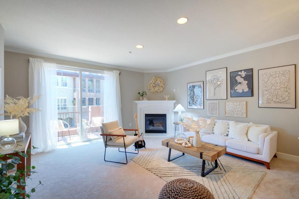 *Location, Convenience, Lifestyle! Toll Brother high-end townhouse style home in the well-known Villas at Lundy community. *Open and bright floor plan with lots of natural light. Living room has a cozy fireplace and connects to a large balcony, good for family gatherings. *This bright and sunshiny home is perfect for entertaining with a fabulous kitchen boasting granite countertop and breakfast bar. *LARGE master suite with vaulted ceiling and walk-in closet. Spacious master bath features dual sinks, tub and separate shower. *Large loft can be used as an office, media room, etc. 1-car attached garage plus second parking space in the community. In house laundry. *Resort style living with many amenities in the community including swimming pool, exercise gym, hot tub/sauna, and club house. *Prime location. Near Google shuttle bus, Ranch 99, H-Mart, Costco, Post Office, lots of retails and restaurants. Easy commute to high tech firms including Google, Apple s N. San Jose campus and Bart Station