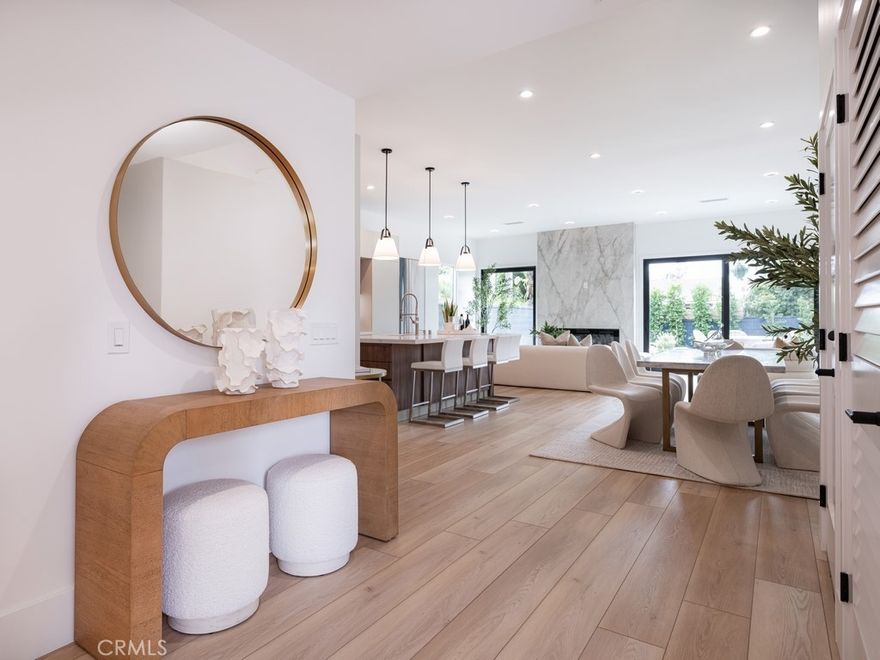 Modern Architectural Masterpiece with ADU Permits & Pickleball Court

This stunning Meyer Place residence is more than a home—it’s a lifestyle investment. The main residence spans 1,772 sq ft and features 3 bedrooms, 2 full bathrooms and 1 powder room. This property offers unmatched flexibility for rental income, private guest quarters, or multi-generational living.The main residence itself has been completely reimagined—essentially brand-new construction in one of Costa Mesa’s most coveted neighborhoods. Meyer Place is a community celebrated for its pride of ownership, family-friendly energy, and beloved annual 4th of July parade and fireworks.

Step inside to discover a custom-designed architectural floor plan with soaring 10-foot flat ceilings that flood the open-concept living areas with natural light. The showpiece kitchen showcases imported Italian cabinetry by Stosa, sleek quartz countertops, an oversized island, and a full KitchenAid appliance suite, making it a true centerpiece for both daily living and entertaining.

Evenings on Meyer Place are designed to impress. The private backyard retreat includes an exclusive pickleball-ready sport court—rare to find in this area. Professionally designed landscaping with accent lighting frames the modern architecture, while a beautifully lit citrus tree centerpiece creates a warm, inviting ambiance for gatherings. Indoors, a sleek fireplace wall and wide-opening glass doors seamlessly connect the living space to the outdoors.

Finally, location completes the package: just 2 miles from Newport Beach and Lido Marina Village, where world-class dining, shopping, and coastal lifestyle await.

This home is the perfect blend of architectural design, modern lifestyle, and smart investment—a rare opportunity in one of Costa Mesa’s most celebrated communities.