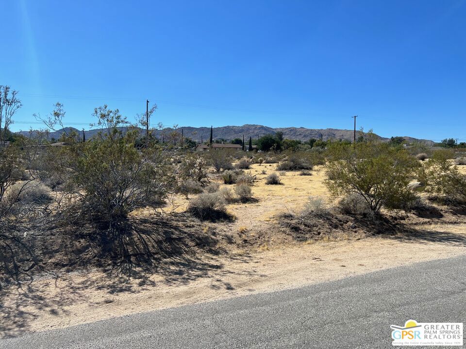 SPECTACULAR DEVELOPMENT OPPORTUNITY. Seller states it's zoned for 3 units check listing docs for layout plan. Seller has plans for 3 1200 sq ft units 2/2 with carports. OWNER WILL CARRY WITH 20% DOWN @ 4.5% FOR 12-15 MONTHS. Easy to develop...NO JOSHUA TREES TO WORRY ABOUT. Adjacent to the downtown area with restaurants and shops. Currently there is a shortage of long term rentals in JT. Close to the park entrance.