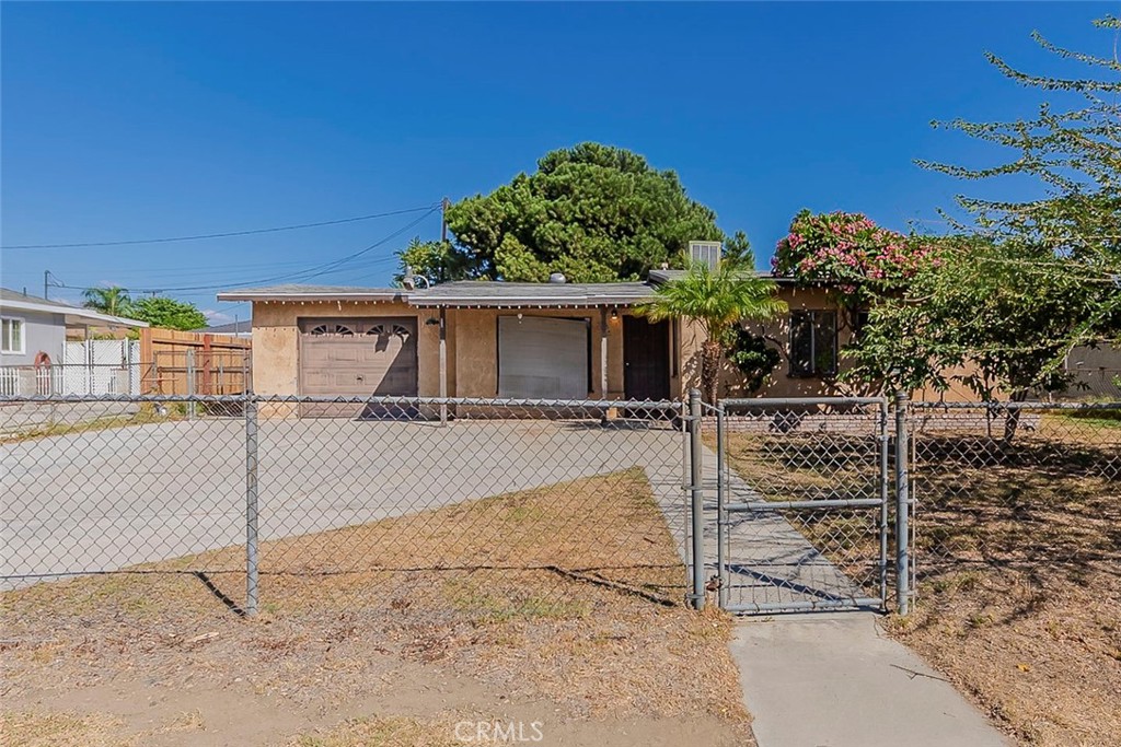 Charming 3-bedroom, 1-bath home offers approx. 954 sq ft of living space on a spacious 8,668 sq ft lot. Step inside to find a comfortable layout with plenty of natural light, an inviting living area, and a functional kitchen ready for your personal touch. Additional features include an enclosed patio, detached garage, convenient indoor laundry, and central air for year-round comfort. The expansive backyard provides endless possibilities—garden, play area, outdoor entertaining, or even future expansion. Ideally located in the heart of Fontana, you’ll enjoy close proximity to schools, shopping, dining, parks, and easy freeway access. A wonderful opportunity for first-time buyers, downsizers, or investors looking for a property with both charm and potential.