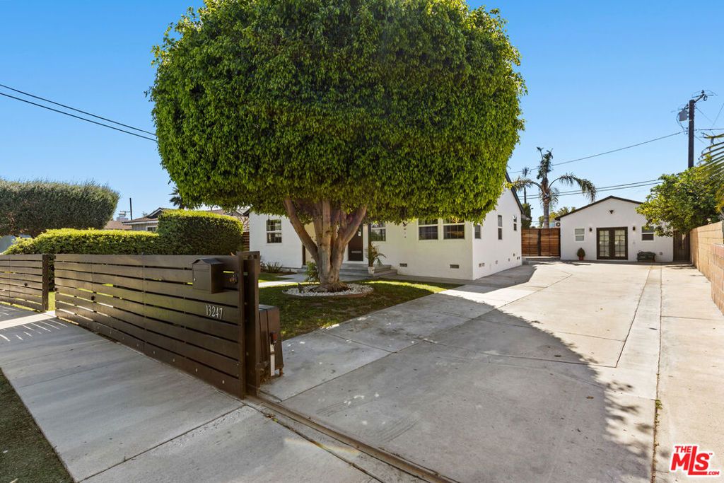 Photo of 13247 Deming Avenue, Downey, CA 90242 (MLS # 26662189)