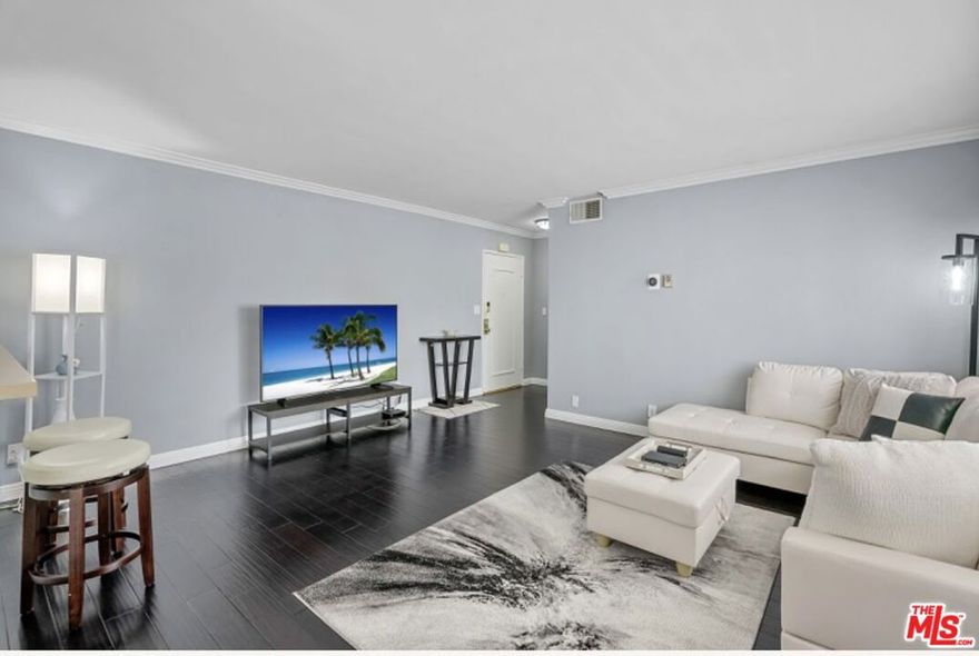 Stylish 1BR/BA condo in prime Brentwood! Tucked on a quiet cul-de-sac near Brentwood Village and Rec Center, this updated bright 4 th floor unit features an airy open floor plan with a spacious dining/living room with gas-burning fireplace. The adjacent kitchen boasts stainless steel appliances, custom cabinetry and a breakfast bar. Down the all find a generous primary bedroom and updated full bath. Other features include plantation shutters, hardwood floors, crown molding, and three closets that provide tons of storage space. Updates include newly installed central HVAC system, dual-pane windows and a Nest thermostat. Building includes rooftop sundeck, community laundry and secure gated garage with one assigned parking space. Offered furnished or unfurnished. HOA approval for in-unit washer/dryer. Low HOA dues include water, gas and earthquake insurance. No pet restrictions. Walk to shops, dining, Whole Foods and Barrington Park - a true Westside gem! Great investment or owner user!