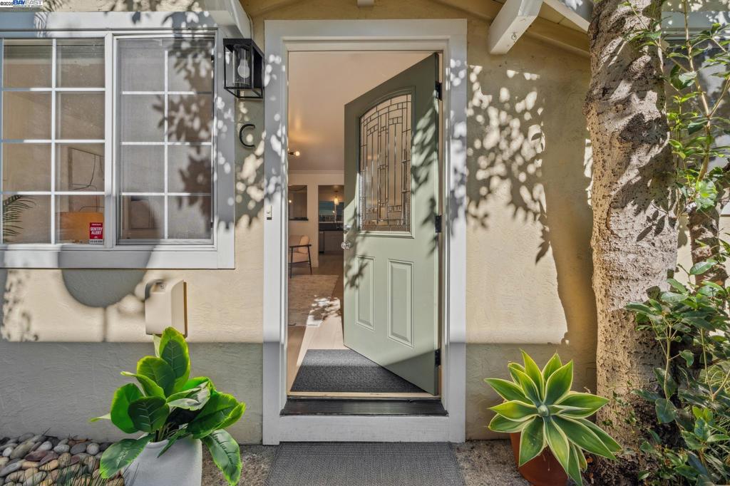Location, Location, Location! Located in the highly desirable and coveted Rockridge community, this ground floor secluded home embraces your lifestyle. With a generous front patio area PLUS a very large, fenced and private side yard; along with excellent Walk and Bike scores, you are sure to find your busy lifestyle at ease with super easy access to College Avenue, Temescal District area, parks, shops, restaurants, BART and easy freeway access.  Completely turnkey, this special home offers a bright and sunny glow, crisp finishes, modern eat-in kitchen, laundry facilities adjacent to back of unit and back yard, garage parking plus drive way and street parking, garage storage room, low HOA fees and no rental restrictions-a rare opportunity.