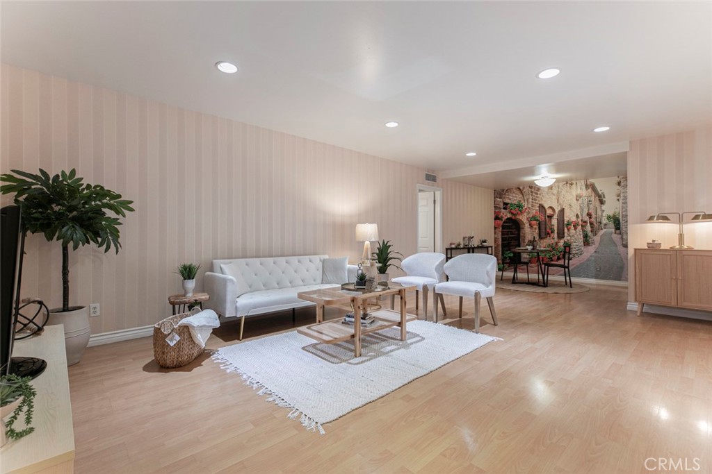 Welcome to this spacious and inviting 2-bedroom, 2-bathroom residence offering 1,150 sq. ft. of comfortable living. With a functional layout, abundant natural light, and subtle Italian-inspired touches, this home provides both charm and practicality. Nestled in a well-kept Spanish style complex, residents enjoy access to a sparkling community pool along with the convenience of nearby shopping, dining, public transportation, the Americana at brand and local amenities. Perfect for first-time buyers or anyone seeking a stylish and comfortable home in a vibrant community. Don’t miss the opportunity to make this lovely home your own!
