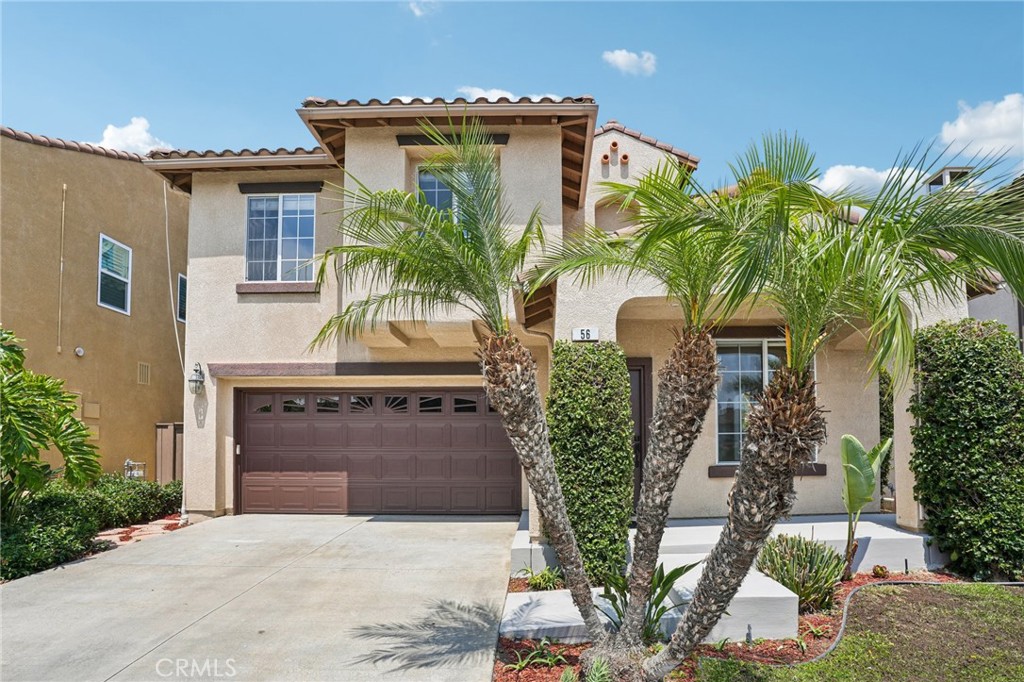 Welcome to 56 Avenida Merida, coastal living at its best! Nestled in the Villa Pacifica community of San Clemente, this beautifully maintained home offers 3 spacious bedrooms plus a versatile loft/bonus area, and 2.5 bathrooms. Step inside to find a welcoming formal living and dining room, ideal for entertaining. The heart of the home is the light-filled great room, where the kitchen seamlessly flows into the family room with a cozy fireplace. The kitchen features a center island, stainless steel appliances (including the refrigerator), and plenty of cabinet space. Upstairs, all bedrooms offer comfort and privacy, including the expansive primary suite featuring a walk-in closet, dual vanities, a separate soaking tub, and a walk-in shower. A convenient upstairs laundry room comes complete with a washer and dryer. The low-maintenance backyard is perfect for relaxing or hosting casual gatherings, while the attached garage offers generous built-in storage. Directly across the street, enjoy a neighborhood park and tot lot. All this, just minutes from San Clemente’s pristine beaches, scenic parks, shopping, dining, and recreational activities. Don’t miss your chance to live in one of San Clemente’s most charming coastal communities!