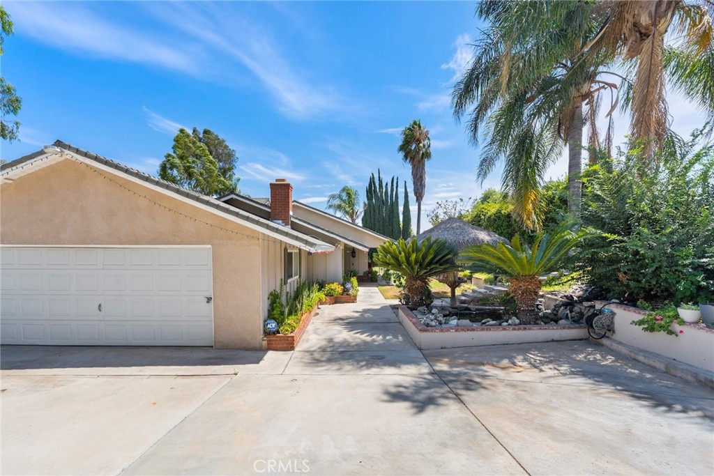 Beautiful 4 bedroom, 2 bathroom home located in the quiet horse community of Jurupa Valley. Enjoy features like a gorgeous pool, koi pond, spacious driveway, solar panels, and even an extra lot beside the property offering ADU potential. Just a short drive from the I-15, SR-91, & SR-60 FWY as well as shopping centers. Perfect home for entertainers, come schedule a showing!