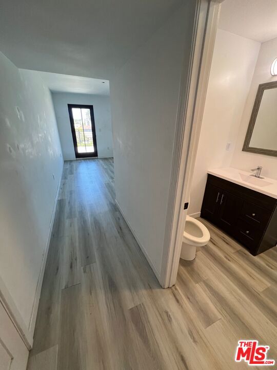 This is a Room for Rent. Private Room en suite with private balcony. Full private Bathroom is attached. Updated home with new flooring and new paint. Street Parking, no appointed parking space. Washer and Dryer in home. Close to Hollywood and East Hollywood.