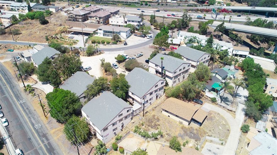 Hilltop Apartments is an excellent value add opportunity in the up and coming neighborhood of Lemon Grove. The property features 6 stand alone buildings, each containing 4 units, nestled among mature trees and parklike landscaping with walkways throughout. Units are rented under market value due the the condition of the exterior of the building, but with some cosmetic upgrades there is a clear cut opportunity to significantly raise rents and maximize this property’s earning potential. Hilltop Apartments consists of 24 townhome style apartments with a good unit mix of 2 and 3 bedrooms. The floorplans are functional and inviting with all of the common living space downstairs including a dedicated half bathroom and all of the bedrooms upstairs. Each unit is individually metered for electrical. Property features onsite income producing laundry room, maintenance storage area, and large common picnic area. Exterior: ,,