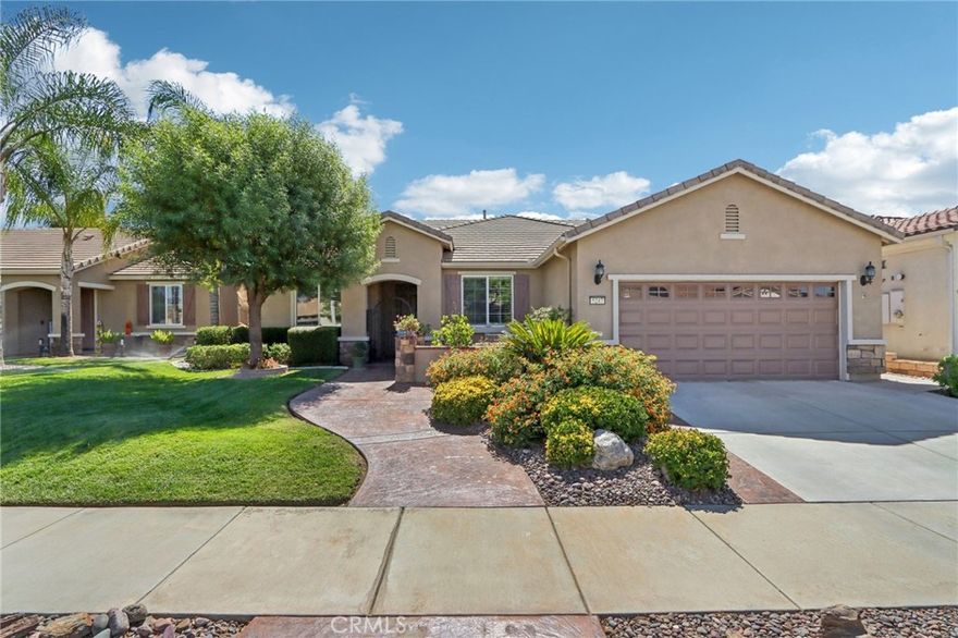 ? Gorgeous Home in Solera Diamond Valley by Del Webb – 55+ Resort-Style Living ?  Welcome to this stunning home in the highly sought-after Solera Diamond Valley by Del Webb, a premier 55+ gated community offering exceptional amenities and an active lifestyle.  From the moment you arrive, you’ll be captivated by the gorgeous curb appeal, stamped concrete walkway, and beautiful front patio—perfect for relaxing and enjoying the serene surroundings.  Step inside to an open-concept layout designed for both comfort and entertaining. The formal living and dining rooms offer elegant spaces for gatherings, while the family room with cozy fireplace creates a warm, inviting atmosphere.  The chef’s kitchen features granite countertops, stainless steel appliances, a pantry, and a charming breakfast nook—ideal for your morning coffee.  You’ll love the plantation shutters throughout and thoughtful upgrades in every room.  The spacious primary suite includes a large walk-in closet and a luxurious bath with granite countertops and a step-in shower.  Two additional guest bedrooms share a beautifully upgraded bathroom, also with granite counters and a step-in shower.  The laundry room offers convenience with extra cabinetry, storage, and a utility sink.  Outside, enjoy your private oasis in the fully finished backyard—complete with lush professional landscaping, raised planters, rain gutters, and an alumawood pergola and patio cover, perfect for year-round entertaining.  Located in a central spot within the community, this home is just minutes walk from the clubhouse, where you can take advantage of resort-style amenities, fitness centers, pools, and social activities.  Come experience the perfect blend of elegance, comfort, and vibrant 55+ living—this Solera Diamond Valley gem truly has it all!