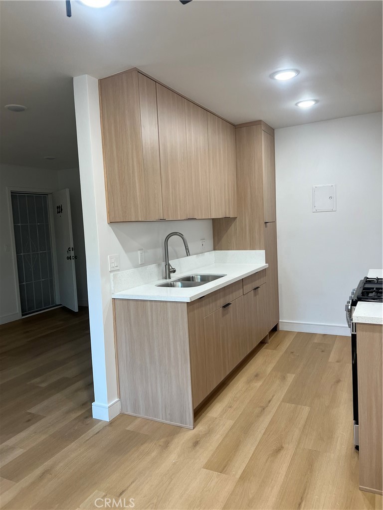 Stunning second-floor, two-bedroom one-bath condo, fully remodeled with brand-new appliances, 2 parking spaces, close to 405 freeway A fantastic investment opportunity, can be rented for $2600 per month, don’t miss your chance to call this home yours!