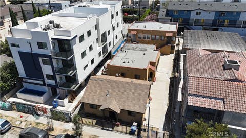 Photo of 3914 S Normandie Avenue, Los Angeles, CA 90037 (MLS # SB26170801)