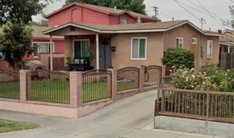 Photo of 6823 Vinevale Ave, Bell Gardens, CA 90201 (MLS # DW26008538)