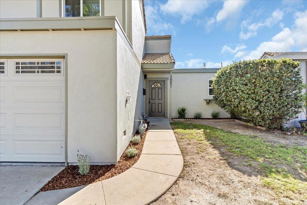 Welcome to 1521 Ebro Circle in North Salinas, a beautifully renovated home that feels brand new from top to bottom. Every detail has been thoughtfully redone, including all new electrical, plumbing, insulation, drywall, and energy-efficient windows. The home has been freshly painted inside and out, showcasing a modern, clean aesthetic that perfectly complements the high-quality finishes throughout. Inside, you'll find stunning quartz countertops and custom cabinetry in the kitchen and bathrooms, offering both elegance and functionality. The main living areas feature durable and stylish luxury vinyl plank flooring, while the upstairs bedrooms are finished with soft new carpeting for added comfort. This thoughtfully reimagined home offers an inviting layout filled with natural light, blending modern design with everyday livability. Conveniently located near schools, shopping, and major commuting routes, this North Salinas gem is completely move-in ready, offering the perfect combination of quality, comfort, and contemporary style.