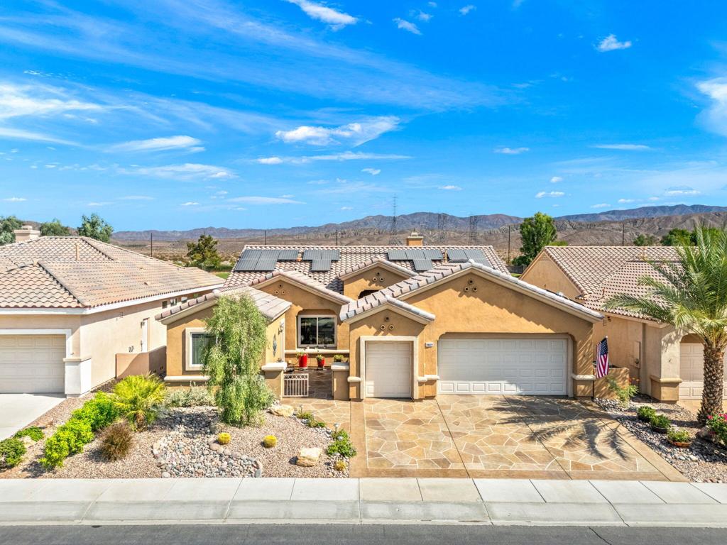 55+ Del Webb Sun City Palm Desert--The Best ''Bang for your Buck'' in the Coachella Valley! Introducing a truly MAGNIFICENT redesigned and reimagined home that will make all your dreams come true! The impressive unique design merges the indoor and outdoor entertaining lifestyle to perfection. This impeccably upgraded 4 bedroom/3 bath POOL home, with additional fully extended guest CASITA (rental income), features super open concept (wall removed), beautiful tile t/o, custom gas fireplace, all new windows in 2018. SOLAR is leased, whole house water filtration system, HVAC 3 years old, Mini-split in casita and laundry room. WOW!!! Chefs crafted gourmet kitchen includes large flat island with gorgeous quartz counters, subway glass backsplash, stainless double ovens, and kitchenette area with a view. Living room and dining room has been extended 6 feet with new floor-to-ceiling sliding glass doors, opening to the spacious private backyard, GREENBELT, and new sparkling salt water pebble-tec SPOOL/SPA with waterfall and meandering river. Extended master bedroom, bathroom has been uniquely designed to include private luxurious bathtub/jacuzzi. Guest bedroom #1 is extended with views of the patio and pool. Guest bedroom #2 can double as an office/work-out/den space. Extended casita features murphy bed, full bath with tub, washer/dryer, refrigerator, kitchenette. Spacous laundry room. Golf cart garage was added as the icing on the cake! This stunning home is ready for fabulous entertaining!