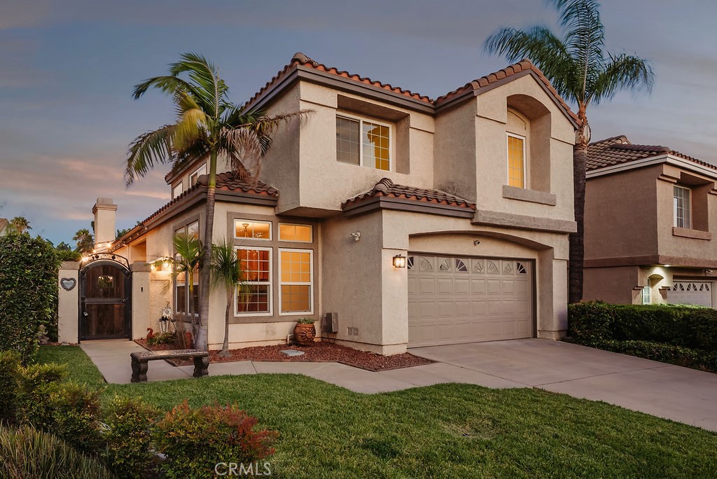 Nestled in one of Rancho Cucamonga's most sought-after neighborhoods. Enter through the hacienda style gate and discover a Flagstone courtyard. Complete with cafe lighting that greets you with a lush green yard that will make you feel like you are at a five-star resort.
This Hacienda-style home has thoughtful updates throughout. Including a gourmet kitchen with rich-wood cabinetry that complement the earth-toned granite counter tops, and stainless steel appliances. Any chef can easily enjoy a great cooking experience and host a quaint get-together in the bright and romantic breakfast room that sits adjacent to the kitchen.
Hosting will be a delight in the vast open space of the great room. Vaulted ceilings and a sunlit family room, creates an inviting environment for all to enjoy! Ceiling fans are in every room complementing the airy feel of the home.
The luxurious, primary downstairs master-retreat is complete with a spa inspired bath, parquet laid-tile flooring, warm earth toned cabinetry that offers a generous amount of storage and enough natural lighting that comes in effortlessly. The glass enclosed-shower and dual vanities will suit your modern needs. The Primary room has access to the back patio area where you can step outside and sit under the covered patio with a cup of coffee and enjoy the privacy without compromise.
On the upper level you will find 2 west facing bedrooms and one large bath with gorgeous tiling throughout. Find yourself reading upstairs in the large open loft area or choose to have it as an office/game-room for the guests that will feel comfortable in the ample space.
Complete with a new electrical panel, new interior paint and a new HVAC system, this home will keep you cool in the summers and warm in the winters. The views from the second story will have you mesmerized with the snow capped mountains and gorgeous views of the neighborhood. For your electric vehicle charging needs, a new Tesla charger is included in the two-car garage. This home offers unparalleled convenience and luxury.
Centrally located near the 210/10/15 freeways, close to shopping, the Victoria Gardens mall, award-winning schools and horse trails. 6701 Marsala Place, isn't just a house, it's an upgraded lifestyle.
